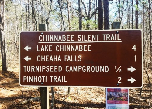 Signpost for Chinnabee Silent Trail with directions to Lake Chinnabee, Cheaha Falls, Turnipseed Campground, and Pinhoti Trail.