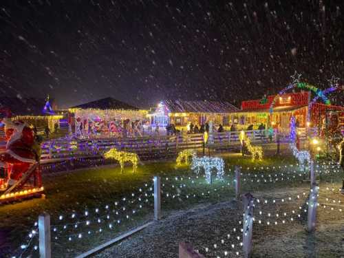 A festive scene with colorful Christmas lights, snow falling, and decorated buildings in a winter wonderland.