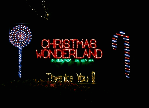 Colorful holiday lights spell out "Christmas Wonderland" and "Thank You!" against a dark background.