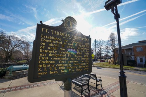 Historical marker for Ft. Thomas Army Post, detailing its construction, jurisdiction, and first commander. Sunny day backdrop.