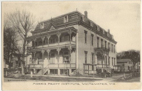 Historic black-and-white postcard of the Morris Pratt Institute in Whitewater, Wisconsin, showcasing its architectural details.