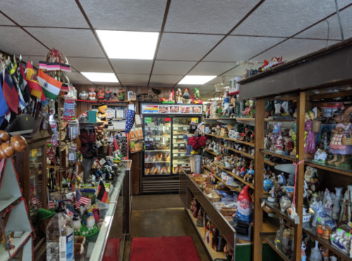 A cozy shop filled with various collectibles, souvenirs, and decorations, showcasing a vibrant and eclectic display.