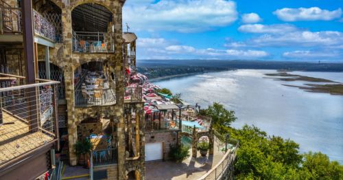 the balcony tiers of The Oasis on Travis Lake in Austin, Texas, on a sunny day