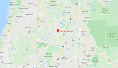 Map showing a location marked at 27839 Saint Joe Road, surrounded by green areas and nearby towns in Florida.
