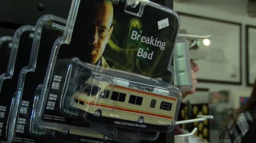 A toy model of an RV from "Breaking Bad," displayed in packaging featuring a character's image.