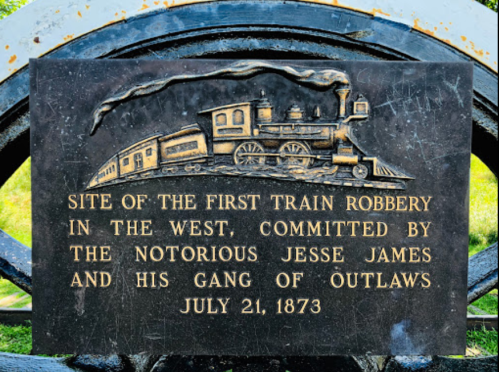 Plaque commemorating the site of the first train robbery in the West by Jesse James and his gang on July 21, 1873.