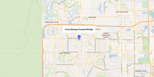 Map showing Coral Springs Covered Bridge location, marked by a blue dot, with surrounding streets and areas.