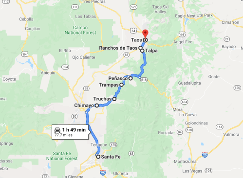Map showing a route from Santa Fe to Taos, New Mexico, with a travel time of 1 hour and 49 minutes over 77.7 miles.