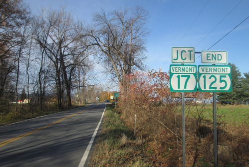 Road signs indicating the junction and end of Vermont Route 17 and Route 125, with a rural landscape in the background.