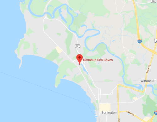 Map showing the location of Donahue Sea Caves near Burlington, Vermont, with nearby roads and waterways.