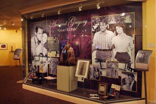 Exhibit titled "Ava and Gregory: Great Old Pals," featuring photos and memorabilia of the two actors.