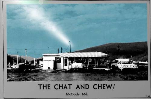 A vintage diner called "The Chat and Chew" in McCoole, MD, with classic cars parked outside and a blue sky above.