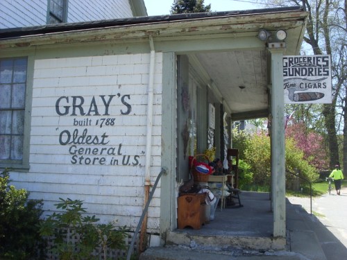Exterior of Gray's General Store, built in 1788, featuring a sign that reads "Oldest General Store in U.S."