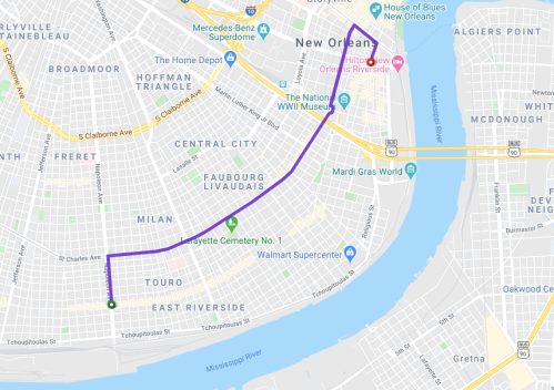 Map of New Orleans showing a route from the WWII Museum to Lafayette Cemetery No. 1, marked in purple.