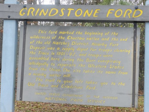 Sign at Grindstone Ford detailing its historical significance and connection to the Choctaw nation and the Old Trace.