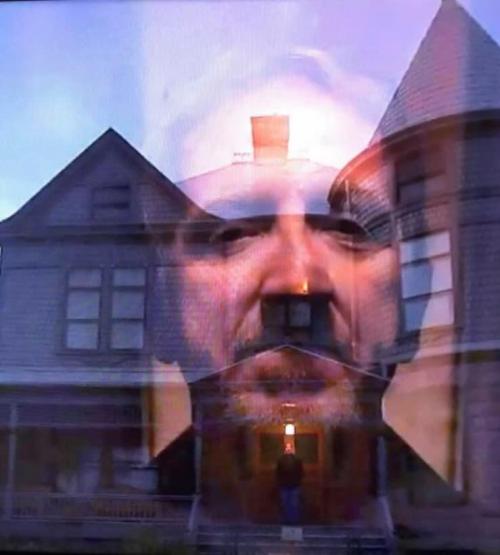 A ghostly face overlays a vintage house, creating a haunting and surreal atmosphere.