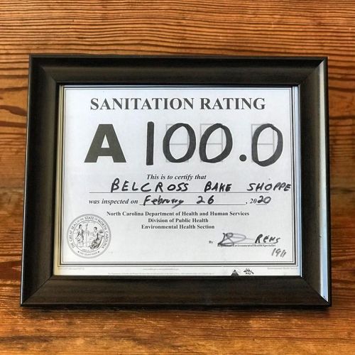 Framed sanitation rating certificate for Belcross Bake Shoppe, scoring A 100.0, dated February 26, 2020.
