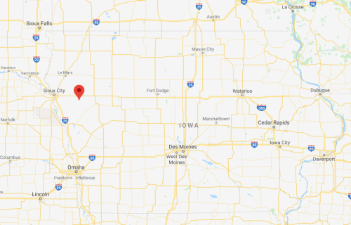 Map of Iowa highlighting a location near Sioux City with a red marker. Major highways and cities are visible.