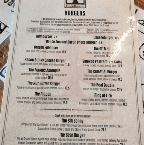 Menu featuring various burgers with prices, including options like the "Breath Enhancer" and "The Big Benny."