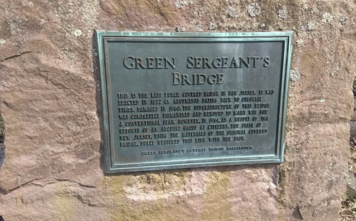 Plaque on Green Sergeant's Bridge, detailing its history and restoration after damage in 1962.