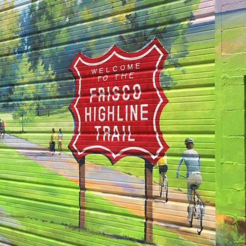 Mural depicting a sign that reads "Welcome to the Frisco Highline Trail," with cyclists in the background.