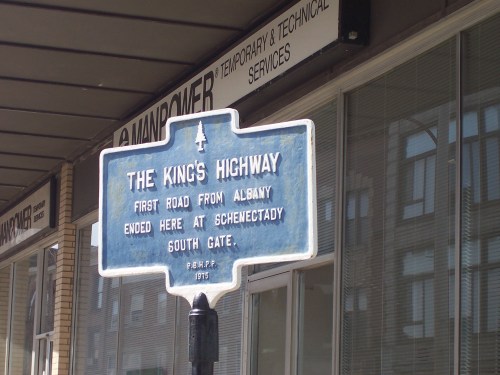 Historical sign for The King's Highway, marking the first road from Albany, located at Schenectady South Gate.