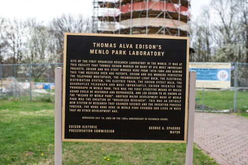 Sign detailing Thomas Edison's Menlo Park Laboratory, highlighting its historical significance and innovations in technology.