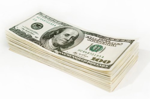 A stack of hundred-dollar bills arranged neatly on a white background.
