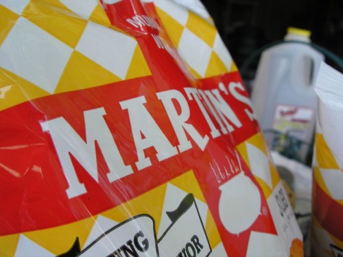 Close-up of a bag labeled "MARTIN'S" with a red and yellow checkered design.