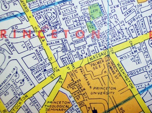 A close-up of a vintage map showing streets and landmarks in Princeton, New Jersey, including Princeton University.
