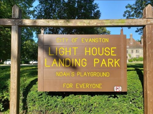 Sign for Light House Landing Park in Evanston, featuring Noah's Playground, with a note that it's for everyone.