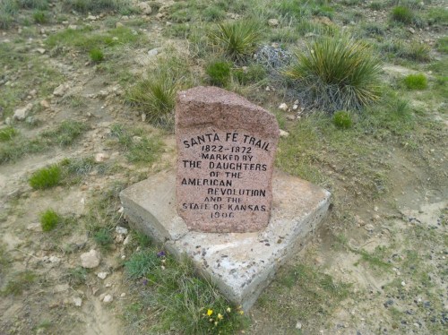 A stone marker commemorating the Santa Fe Trail, established 1822-1872, by the Daughters of the American Revolution, 1906.