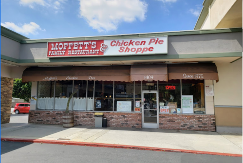 Exterior of Moffett's Family Restaurant & Chicken Pie Shoppe, featuring a welcoming entrance and "Open" sign.
