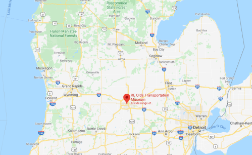 Map showing central Michigan with a marker for the RE Olds Transportation Museum near Lansing.