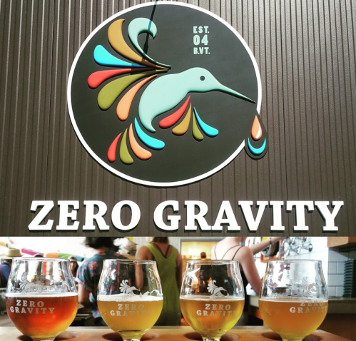 A colorful logo of a hummingbird above four glasses of beer, with "ZERO GRAVITY" prominently displayed below.