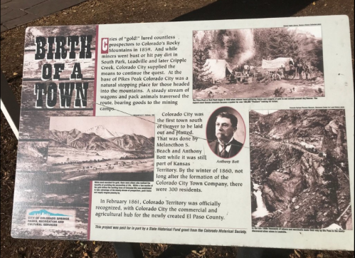 Sign detailing the history of Colorado City, including its founding and early mining activities.