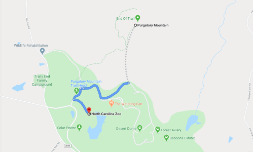 Map showing the North Carolina Zoo area, including trails and landmarks like Purgatory Mountain and the Wildlife Rehabilitation center.