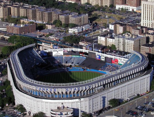 Aerial view of Yankee Stadium, showcasing the iconic structure and surrounding urban landscape.