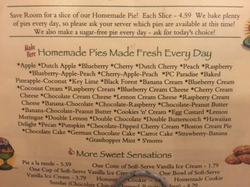 Menu listing of homemade pies with various flavors, including apple, blueberry, cherry, and chocolate, priced at $4.59 per slice.