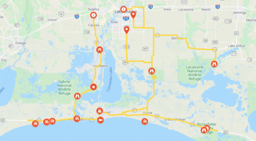 Map showing a route with highlighted points of interest and recreational areas around Lake Charles, Louisiana.