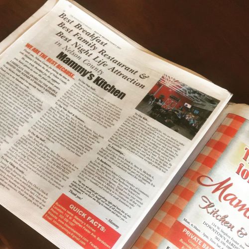 A newspaper article featuring "Mamma's Kitchen" as the best breakfast and nightlife spot in the area.