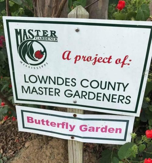 Sign for the Lowndes County Master Gardeners' Butterfly Garden project, featuring the Master Gardener logo.