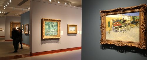 A gallery with framed paintings on the walls, featuring a close-up of a colorful artwork of a carriage.