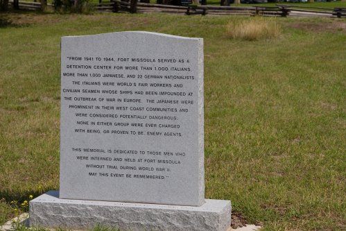A stone memorial at Fort Missoula honors those interned during WWII, including Italians and German nationals.