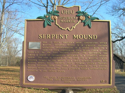 Historical marker for Serpent Mound, detailing its significance and history in Ohio.