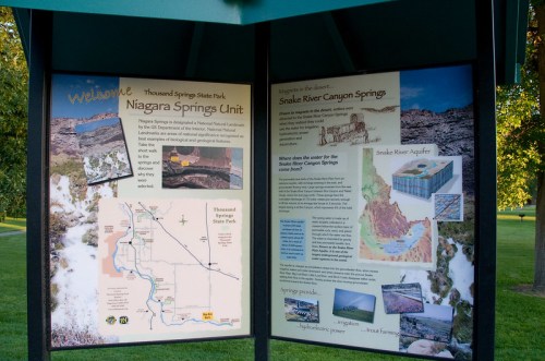 Informational sign at Thousand Springs State Park, featuring maps and details about Niagara Springs and Snake River Canyon Springs.