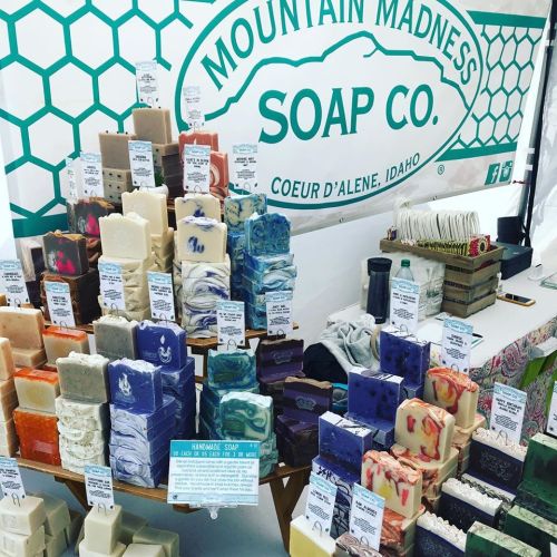 A display of colorful handmade soaps at Mountain Madness Soap Co. booth in Coeur d'Alene, Idaho.