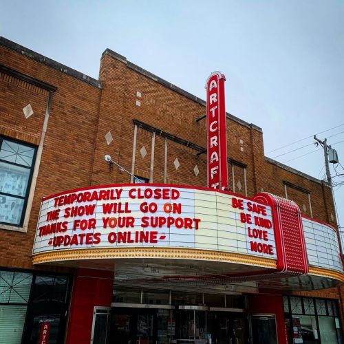 Marquee of the Artcraft Theatre displaying a message about temporary closure and updates online.