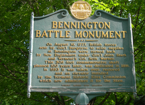 Historical marker for the Bennington Battle Monument, detailing its history and dedication in 1891.