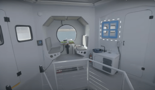 Interior of a modern, minimalist room with circular window, dining area, and kitchenette. Bright and spacious design.